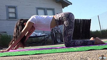 teen with yoga trainer