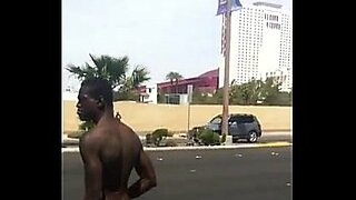 girl stripping naked outside public street posing yoga pants