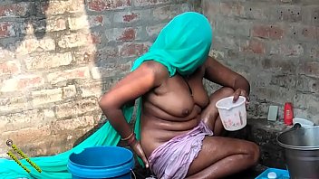 indian girl taking bath in